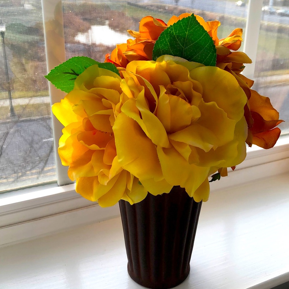Pier 1 faux vase of flowers. 10” tall. Brown, orange, gold colors. New condition